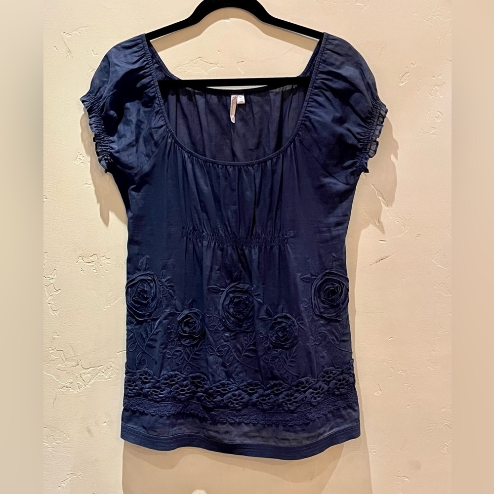 Elegant Sheer Blue Blouse with Floral Embellishments